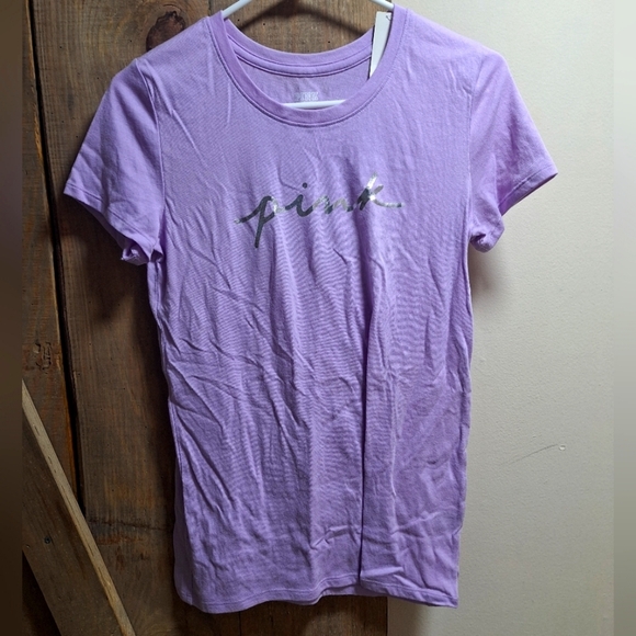 A Pink Victoria Secrets short sleeve purple t-shirt in a size X-Small. NWT. - Picture 1 of 10